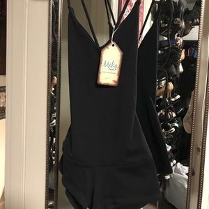 Mika Yoga black onesie